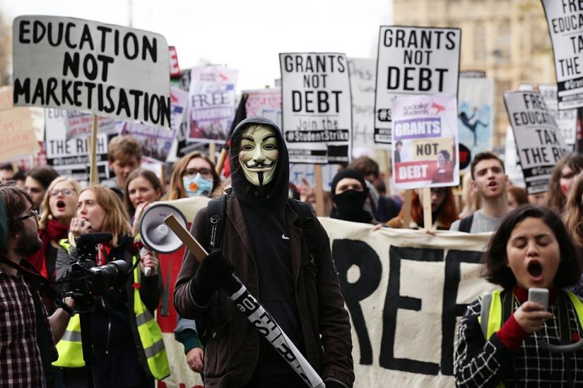 C. Shore lecture The Independent (2017); Students during a protest calling for the abolition of tuition fees and an end to student debt in Westminster, London (PA)