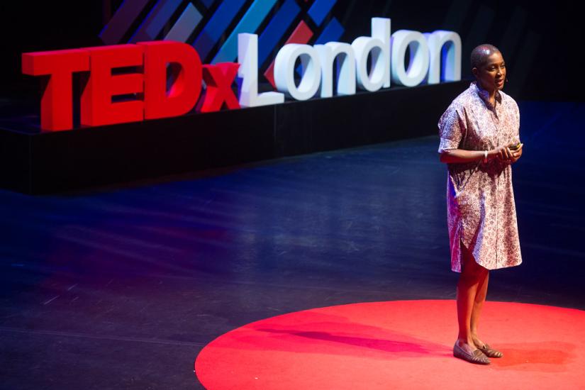 Picture of Yiola Solanke standing on a TEDxLondon stage